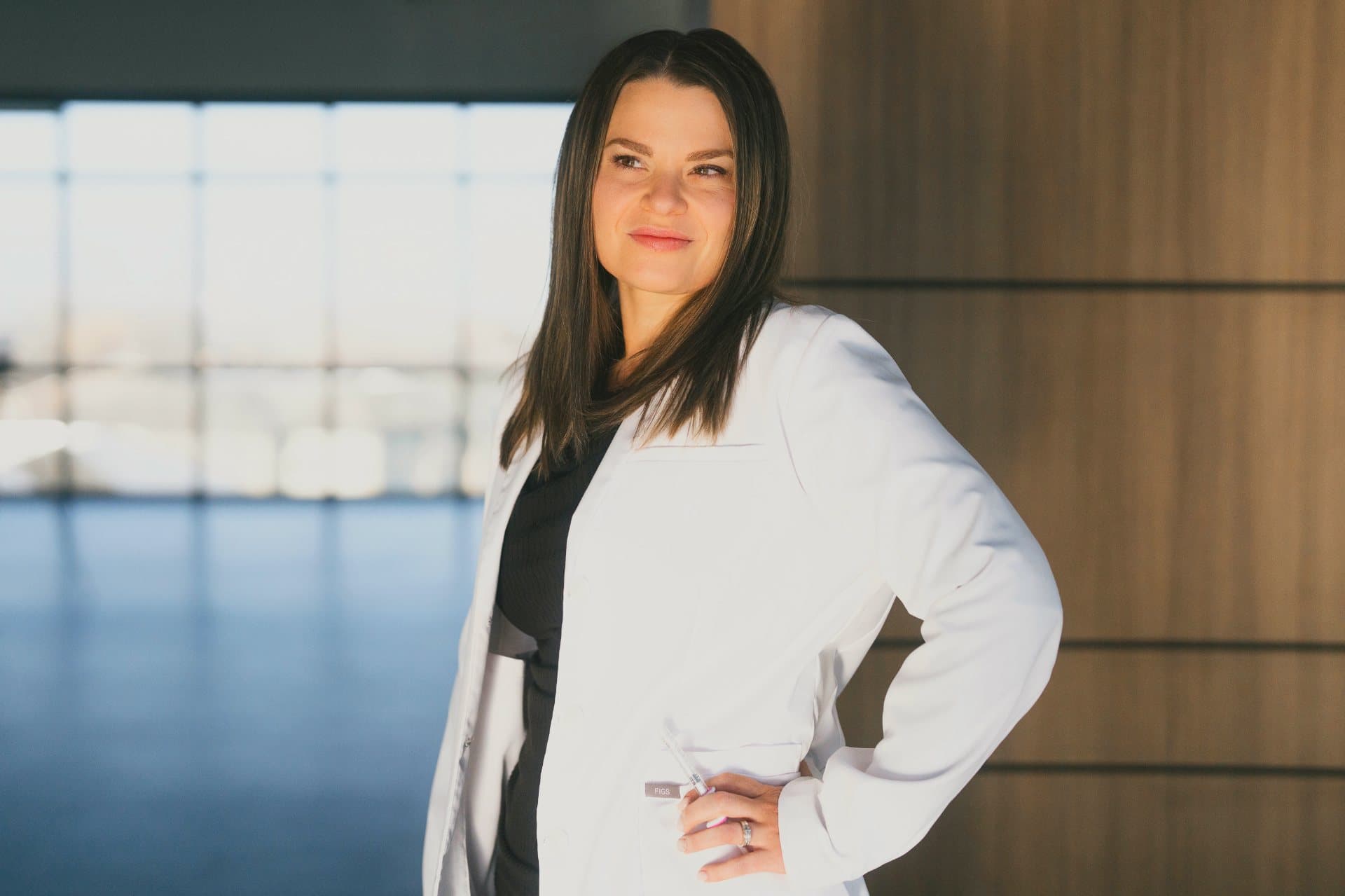 Liz Mackay, NP, in a white clinic coat.